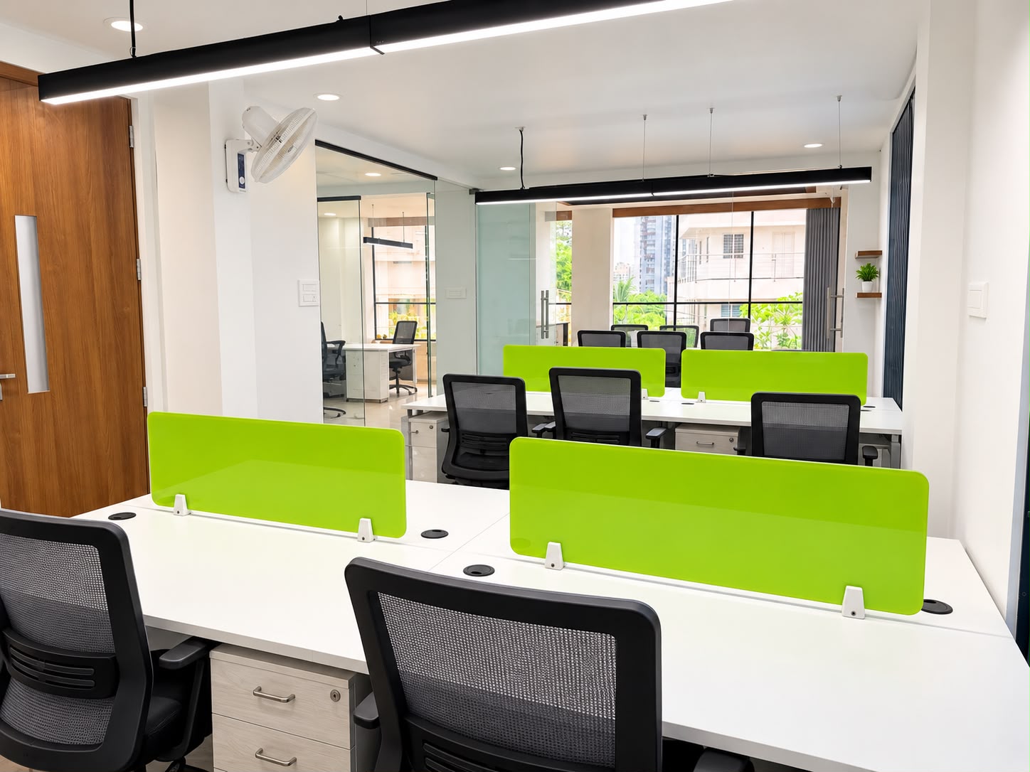 The My Office facility with desks and green partitions